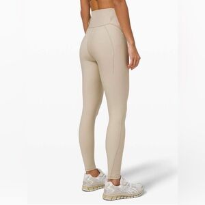 NWT Lululemon Chase the Chill Super High-Rise Tight 28"
Trench size 12